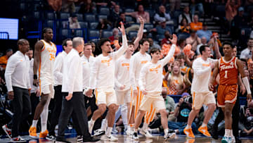 The Tennessee bench celebrates a made three against Texas before a timeout was called during the second half of their quarterfinal game of the SEC Men's Basketball Tournament at Bridgestone Arena in Nashville, Tenn., Friday, March 14, 2025.