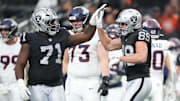 Dec 7, 2025; Paradise, Nevada, USA;  Las Vegas Raiders tight end Brock Bowers (89) reacts with offensive tackle DJ Glaze (71) after catching a touchdown against the Denver Broncos during the first half at Allegiant Stadium. Mandatory Credit: Kirby Lee-Imagn Images