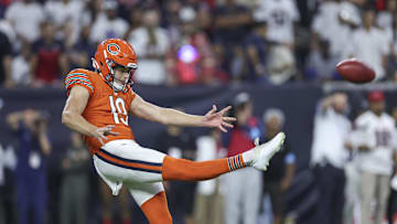 Sep 15, 2024; Houston, Texas, USA; Chicago Bears punter Tory Taylor (19) punts the ball during the game against the Houston Texans at NRG Stadium.