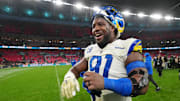 Oct 19, 2025; London, United Kingdom; Los Angeles Rams defensive end Kobie Turner (91) walks off the field after their win against the Jacksonville Jaguars in an NFL International Series game at Wembley Stadium. Mandatory Credit: Kirby Lee-Imagn Images