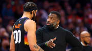 Jan 22, 2022; Phoenix, Arizona, USA; Phoenix Suns center JaVale McGee (00) talks with assistant coach Mark Bryant against the Indiana Pacers at Footprint Center. Mandatory Credit: Mark J. Rebilas-USA TODAY Sports
