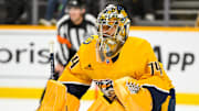 Oct 19, 2024; Nashville, Tennessee, USA;  Nashville Predators goaltender Juuse Saros (74) awaits the face off against the Detroit Red Wings during the second period at Bridgestone Arena. Mandatory Credit: Steve Roberts-Imagn Images