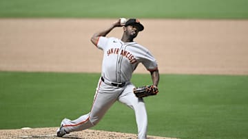 Aug 21, 2025; San Diego, California, USA; San Francisco Giants relief pitcher Joel Peguero (63) delivers during the sixth inning against the San Diego Padres at Petco Park. Mandatory Credit: Denis Poroy-Imagn Images