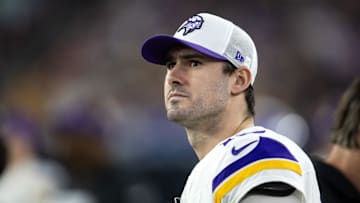 Jan 13, 2025; Glendale, AZ, USA; Minnesota Vikings quarterback Daniel Jones (13) against the Los Angeles Rams during an NFC wild card game at State Farm Stadium. Mandatory Credit: Mark J. Rebilas-Imagn Images