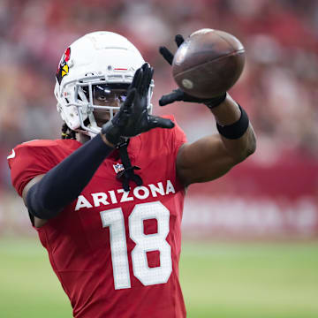 Aug 10, 2024; Glendale, Arizona, USA; Arizona Cardinals wide receiver Marvin Harrison Jr. (18) against the New Orleans Saints during a preseason NFL game at State Farm Stadium. Mandatory Credit: Mark J. Rebilas-Imagn Images
