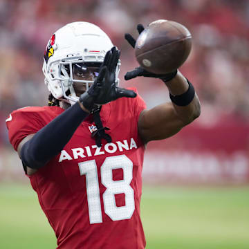 Aug 10, 2024; Glendale, Arizona, USA; Arizona Cardinals wide receiver Marvin Harrison Jr. (18) against the New Orleans Saints during a preseason NFL game at State Farm Stadium. Mandatory Credit: Mark J. Rebilas-Imagn Images
