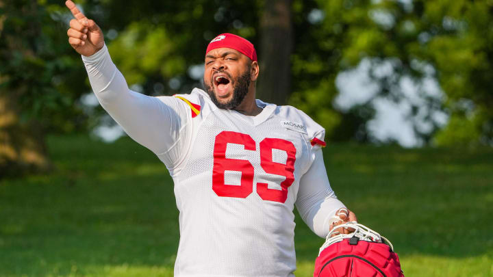 Jul 22, 2024; St. Joseph, MO, USA; Kansas City Chiefs defensive tackle Mike Pennel Jr. (69) gestures to fans while walking from the locker room to the fields prior to training camp at Missouri Western State University. Mandatory Credit: Denny Medley-USA TODAY Sports