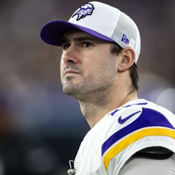 Jan 13, 2025; Glendale, AZ, USA; Minnesota Vikings quarterback Daniel Jones (13) against the Los Angeles Rams during an NFC wild card game at State Farm Stadium. Mandatory Credit: Mark J. Rebilas-Imagn Images