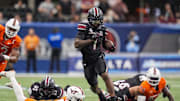Aug 31, 2025; Atlanta, Georgia, USA; South Carolina Gamecocks running back Rahsul Faison (1) runs against the Virginia Tech Hokies during the first half at Mercedes-Benz Stadium. Mandatory Credit: Dale Zanine-Imagn Images