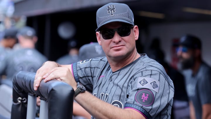 Jul 27, 2024; New York City, New York, USA; New York Mets manager Carlos Mendoza (64) in the dugout before a game against the Atlanta Braves at Citi Field. Mandatory Credit: Brad Penner-USA TODAY Sports