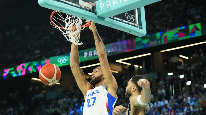 Aug 10, 2024; Paris, France; France centre Rudy Gobert (27) dunks against United States in the men's basketball gold medal game during the Paris 2024 Olympic Summer Games at Accor Arena. Mandatory Credit: Rob Schumacher-USA TODAY Sports