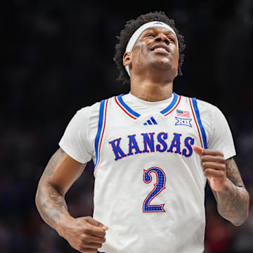Mar 12, 2025; Kansas City, MO, USA; Kansas Jayhawks guard AJ Storr (2) reacts after a play during overtime against the UCF Knights at T-Mobile Center. Mandatory Credit: William Purnell-Imagn Images