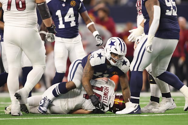 Dallas Cowboys linebacker Micah Parsons sacks Washington Commanders quarterback Sam Howell.