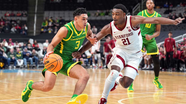  Oregon Ducks guard Jackson Shelstad (3) dribbles against Stanford Cardinal guard Jaylen Blakes (21) during the second half a