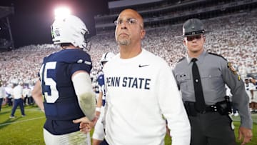 Sep 27, 2025; University Park, Pennsylvania, USA; Penn State Nittany Lions head coach James Franklin and quarterback Drew Allar (15) react after losing to the Oregon Ducks at Beaver Stadium. Mandatory Credit: James Lang-Imagn Images