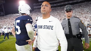 Sep 27, 2025; University Park, Pennsylvania, USA; Penn State Nittany Lions head coach James Franklin and quarterback Drew Allar (15) react after losing to the Oregon Ducks at Beaver Stadium. Mandatory Credit: James Lang-Imagn Images