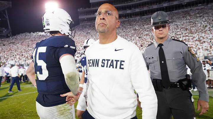 Sep 27, 2025; University Park, Pennsylvania, USA; Penn State Nittany Lions head coach James Franklin and quarterback Drew Allar (15) react after losing to the Oregon Ducks at Beaver Stadium. Mandatory Credit: James Lang-Imagn Images