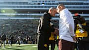 Iowa head coach Kirk Ferentz shakes hands with Minnesota head coach P.J. Fleck before a NCAA Big Ten Conference football game, Saturday, Nov., 16, 2019, at Kinnick Stadium in Iowa City, Iowa.

191114 Minn Iowa Fb 008 Jpg