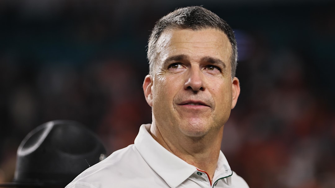 Oct 26, 2024; Miami Gardens, Florida, USA; Miami Hurricanes head coach Mario Cristobal looks on after the game against the Florida State Seminoles at Hard Rock Stadium. Mandatory Credit: Sam Navarro-Imagn Images