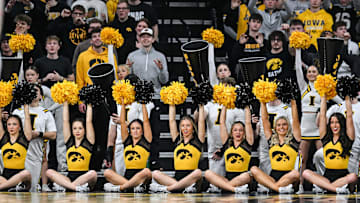 Feb 4, 2025; Iowa City, Iowa, USA; The Iowa Hawkeyes cheerleaders lead the crowd during the second half against the Purdue Boilermakers at Carver-Hawkeye Arena. Mandatory Credit: Jeffrey Becker-Imagn Images