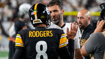 Pittsburgh Steelers quarterback Aaron Rodgers (8) and Cincinnati Bengals quarterback Joe Flacco (16) shake hands after the fourth quarter of the NFL Week 7 game between the Cincinnati Bengals and the Pittsburgh Steelers at Paycor Stadium in downtown Cincinnati on Thursday, Oct. 16, 2025. The Bengals won, 33-31.