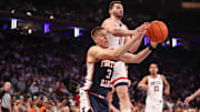 Nov 28, 2025; New York, New York, USA;  Illinois Fighting Illini forward Ben Humrichous (3) and UConn Huskies forward Alex Karaban (11) fight for a rebound in the first half at Madison Square Garden. Mandatory Credit: Wendell Cruz-Imagn Images