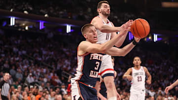 Nov 28, 2025; New York, New York, USA;  Illinois Fighting Illini forward Ben Humrichous (3) and UConn Huskies forward Alex Karaban (11) fight for a rebound in the first half at Madison Square Garden. Mandatory Credit: Wendell Cruz-Imagn Images