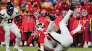 Jan 18, 2025; Kansas City, Missouri, USA; Kansas City Chiefs quarterback Patrick Mahomes (15) is sacked by the Houston Texans during the fourth quarter of a 2025 AFC divisional round game at GEHA Field at Arrowhead Stadium. Mandatory Credit: Denny Medley-Imagn Images