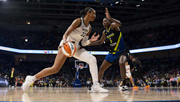 Arlington, Texas, USA; Las Vegas Aces forward A'ja Wilson (22) looks to move to the basket past Dallas Wings forward Natasha Howard (6) during the second half during game three of the 2023 WNBA Playoffs at College Park Center. 