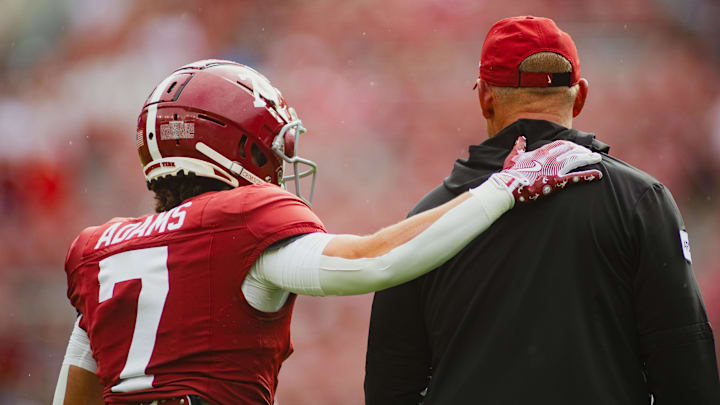 Aug 31, 2024; Tuscaloosa, Alabama, USA; Alabama Crimson Tide wide receiver Cole Adams (7) puts his arm around Alabama Crimson Tide head coach Kalen DeBoer during warm ups at Bryant-Denny Stadium. Mandatory Credit: Will McLelland-USA TODAY Sports