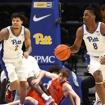 Nov 17, 2025; Pittsburgh, Pennsylvania, USA;  Pittsburgh Panthers guard Omari Witherspoon (8) brings the ball up court on a fast break against the Bucknell Bison during the first half at the Petersen Events Center. Mandatory Credit: Charles LeClaire-Imagn Images