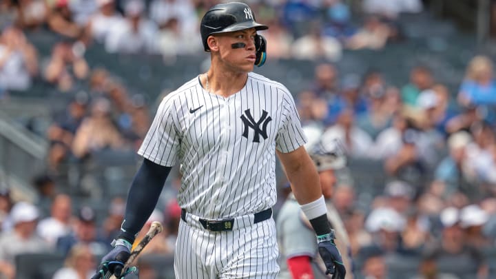 Aug 4, 2024; Bronx, New York, USA; New York Yankees left fielder Aaron Judge (99) looks up after being intentionally  walked during the fifth inning against the Toronto Blue Jays at Yankee Stadium. Mandatory Credit: Vincent Carchietta-USA TODAY Sports