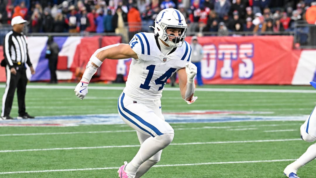 Dec 1, 2024; Foxborough, Massachusetts, USA; Indianapolis Colts wide receiver Alec Pierce (14) runs a route during the second half against the New England Patriots at Gillette Stadium. Mandatory Credit: Eric Canha-Imagn Images