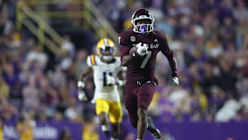 Oct 25, 2025; Baton Rouge, Louisiana, USA; Texas A&M Aggies wide receiver KC Concepcion (7) returns a punt for a touchdown during the second half against the Louisiana State Tigers at Tiger Stadium. Mandatory Credit: Stephen Lew-Imagn Images