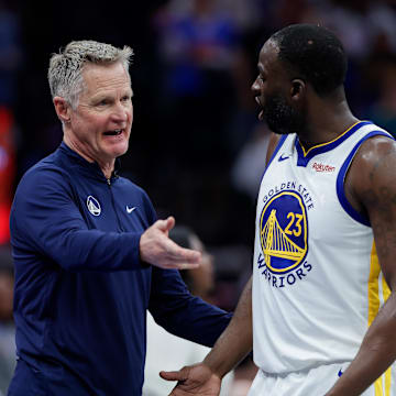 Golden State Warriors forward Draymond Green (23) talks with head coach Steve Kerr during the fourth quarter against the Sacramento Kings at Golden 1 Center. Mandatory Credit: Sergio Estrada-Imagn Images