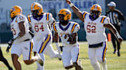 Dec 6, 2024; Birmingham, AL, USA; Jackson's Ezavier Crowell (13) breaks a long touchdown run on the Aggie’s first possession against Cherokee County at Protective Stadium in the AHSAA 4A State Championship game.