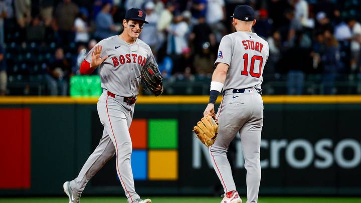Jun 16, 2025; Seattle, Washington, USA; Boston Red Sox right fielder Roman Anthony (19) high fives shortstop Trevor Story (10) following a victory against the Seattle Mariners at T-Mobile Park. Mandatory Credit: Joe Nicholson-Imagn Images
