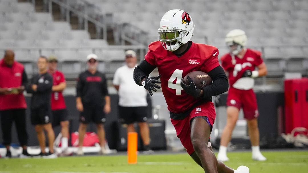 Cardinals running back Jeremiyah Love (4) sprints down the field during training camp at State Farm Stadium in Glendale on July 23, 2026. Cardinals running back Jeremiyah Love (4) sprints down the field during training camp at State Farm Stadium in Glendale on July 23, 2026.