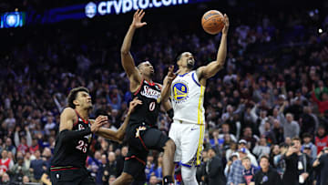 76ers guard Tyrese Maxey (0) blocks the final shot of the game by Golden State Warriors guard De'Anthony Melton.