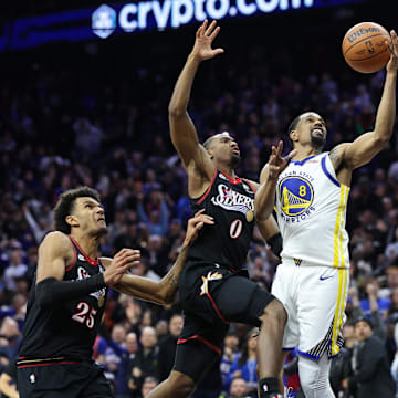 76ers guard Tyrese Maxey (0) blocks the final shot of the game by Golden State Warriors guard De'Anthony Melton.