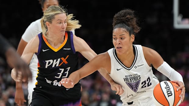 A photo of Sami Whitcomb defending Veronica Burton