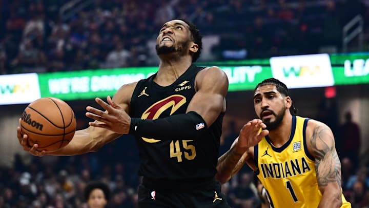 May 13, 2025; Cleveland, Ohio, USA; Cleveland Cavaliers guard Donovan Mitchell (45) drives to the basket against Indiana Pacers forward Obi Toppin (1) during the first half of game five of the second round for the 2025 NBA Playoffs at Rocket Arena. Mandatory Credit: Ken Blaze-Imagn Images May 13, 2025; Cleveland, Ohio, USA; Cleveland Cavaliers guard Donovan Mitchell (45) drives to the basket against Indiana Pacers forward Obi Toppin (1) during the first half of game five of the second round for the 2025 NBA Playoffs at Rocket Arena. Mandatory Credit: Ken Blaze-Imagn Images