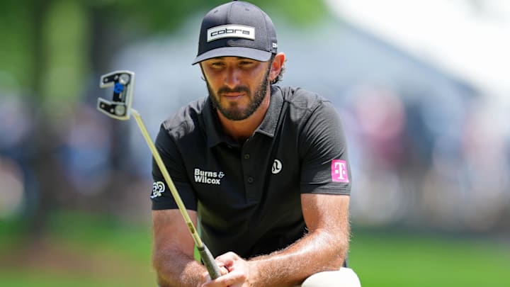 Max Homa lines up a putt on the third green during the third round of the PGA Championship golf tournament at Quail Hollow