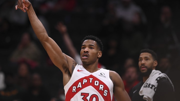 Mar 23, 2024; Washington, District of Columbia, USA;  Toronto Raptors guard Ochai Agbaji (30) shoots a three point basket during the second half against the Washington Wizards at Capital One Arena. Mandatory Credit: Tommy Gilligan-USA TODAY Sports