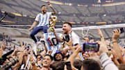 Dec 18, 2022; Lusail, Qatar; Argentina forward Lionel Messi (10) celebrates with fans after winning the 2022 World Cup final against France at Lusail Stadium. Mandatory Credit: Yukihito Taguchi-Imagn Images