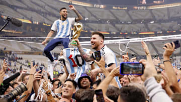 Dec 18, 2022; Lusail, Qatar; Argentina forward Lionel Messi (10) celebrates with fans after winning the 2022 World Cup final against France at Lusail Stadium. Mandatory Credit: Yukihito Taguchi-Imagn Images