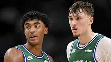 Oct 26, 2025; Dallas, Texas, USA; Dallas Mavericks guard Max Christie (00) talks with forward Cooper Flagg (32) during the second half against the Toronto Raptors at the American Airlines Center. Mandatory Credit: Jerome Miron-Imagn Images