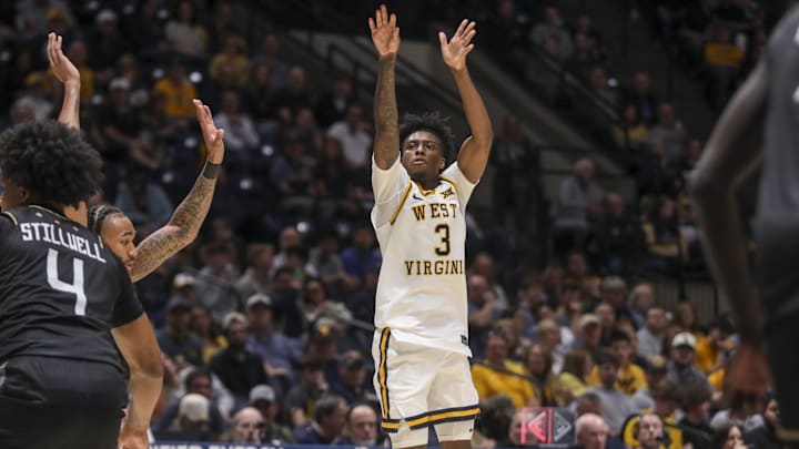 Mar 6, 2026; Morgantown, West Virginia, USA; West Virginia Mountaineers guard Honor Huff (3) shoots a three-point shot during the second half against the UCF Knights at Hope Coliseum. Mandatory Credit: Ben Queen-Imagn Images