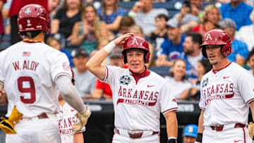 Arkansas Razorbacks Charles Davalan, Logan Maxwell, and Wehiwa Aloy 