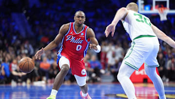 Oct 31, 2025; Philadelphia, Pennsylvania, USA; Philadelphia 76ers guard Tyrese Maxey (0) loses control of the ball against Boston Celtics forward Sam Hauser (30) in the fourth quarter at Xfinity Mobile Arena. Mandatory Credit: Kyle Ross-Imagn Images